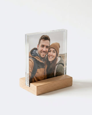 Personalized clear acrylic photo plaque keepsake on a wooden stand