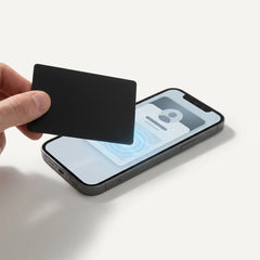 Custom NFC digital business card tapping to share a contact on a smartphone